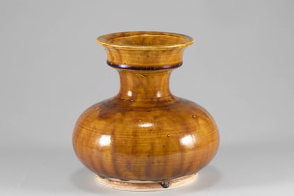 Tang Dynasty Yellow Glazed Pan Mouth Bottle