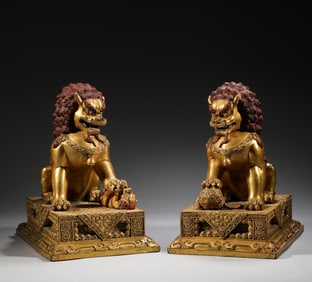 In the Qing Dynasty, a pair of bronze gilded lions