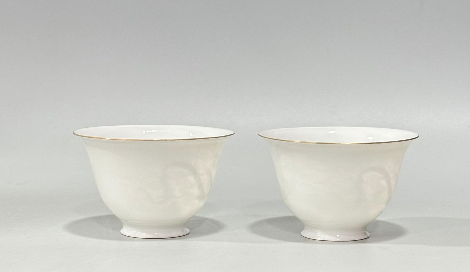 Qing Dynasty Yongzheng White Glazed Dragon Phoenix Chengxiang Cup: H:5.5cm W:8.5cm