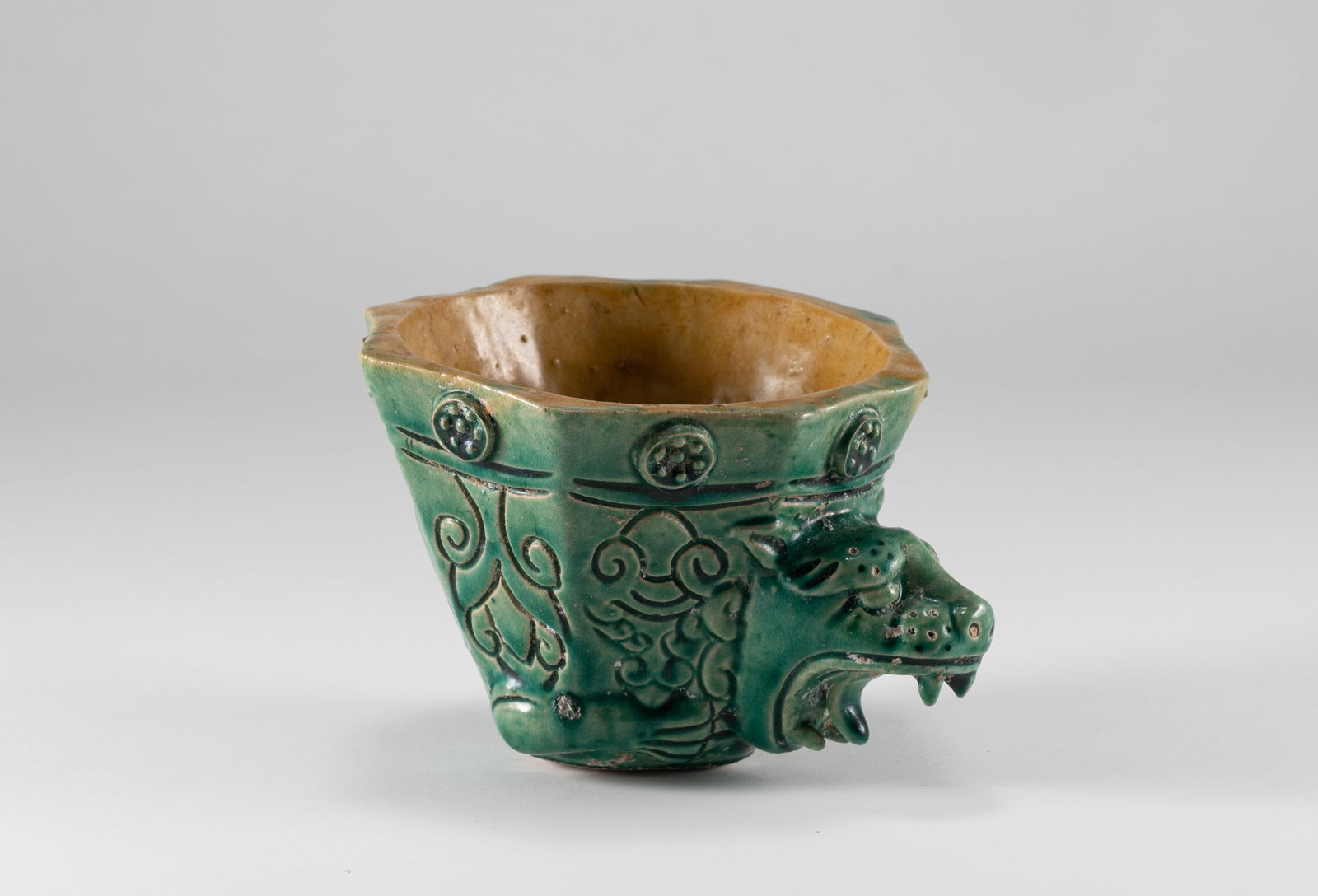 Tang Dynasty yellow green glazed beast head cup: H:7.7cm W:12cm
