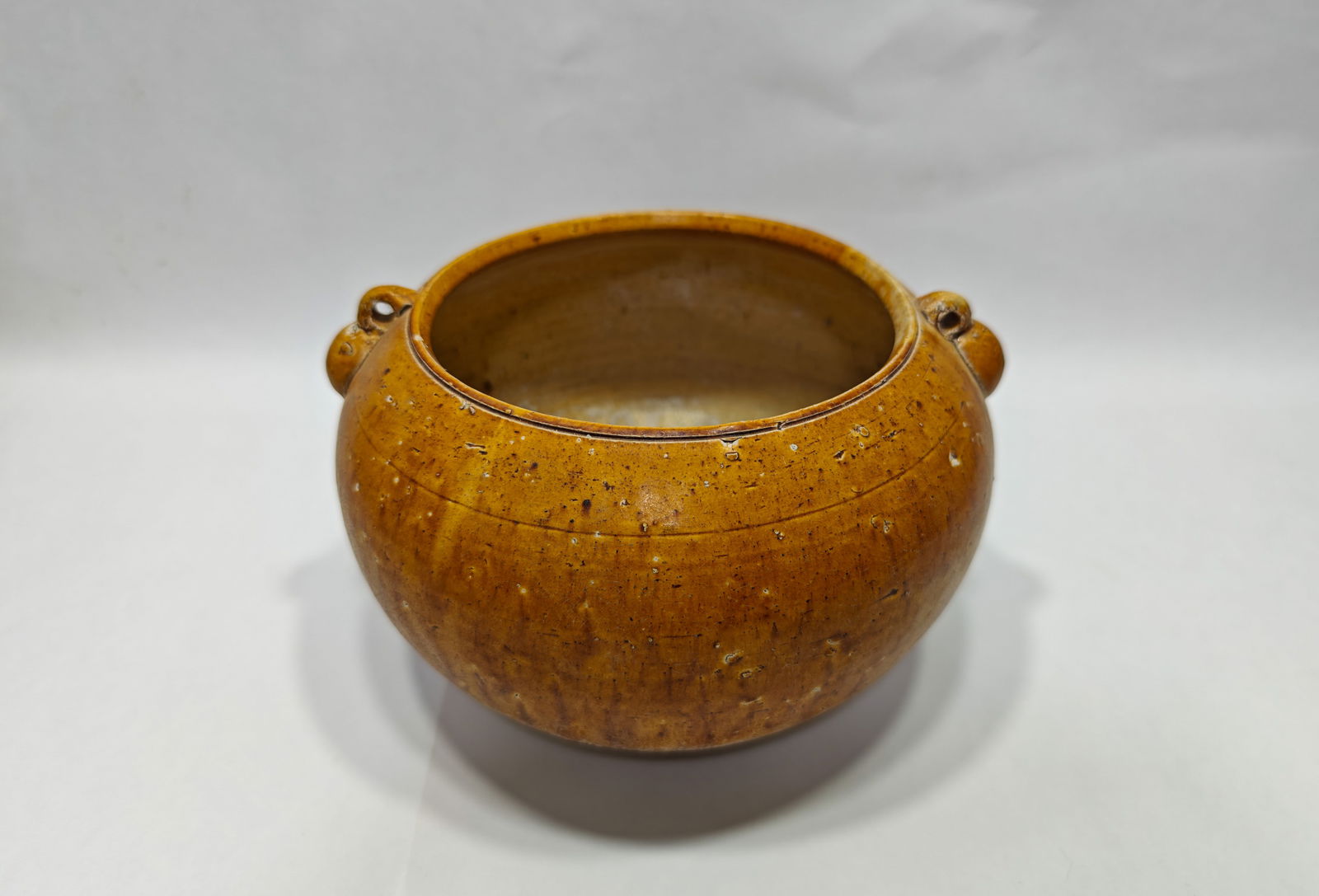 Tang yellow glazed double ear jar: H:13cm W:20.5cm