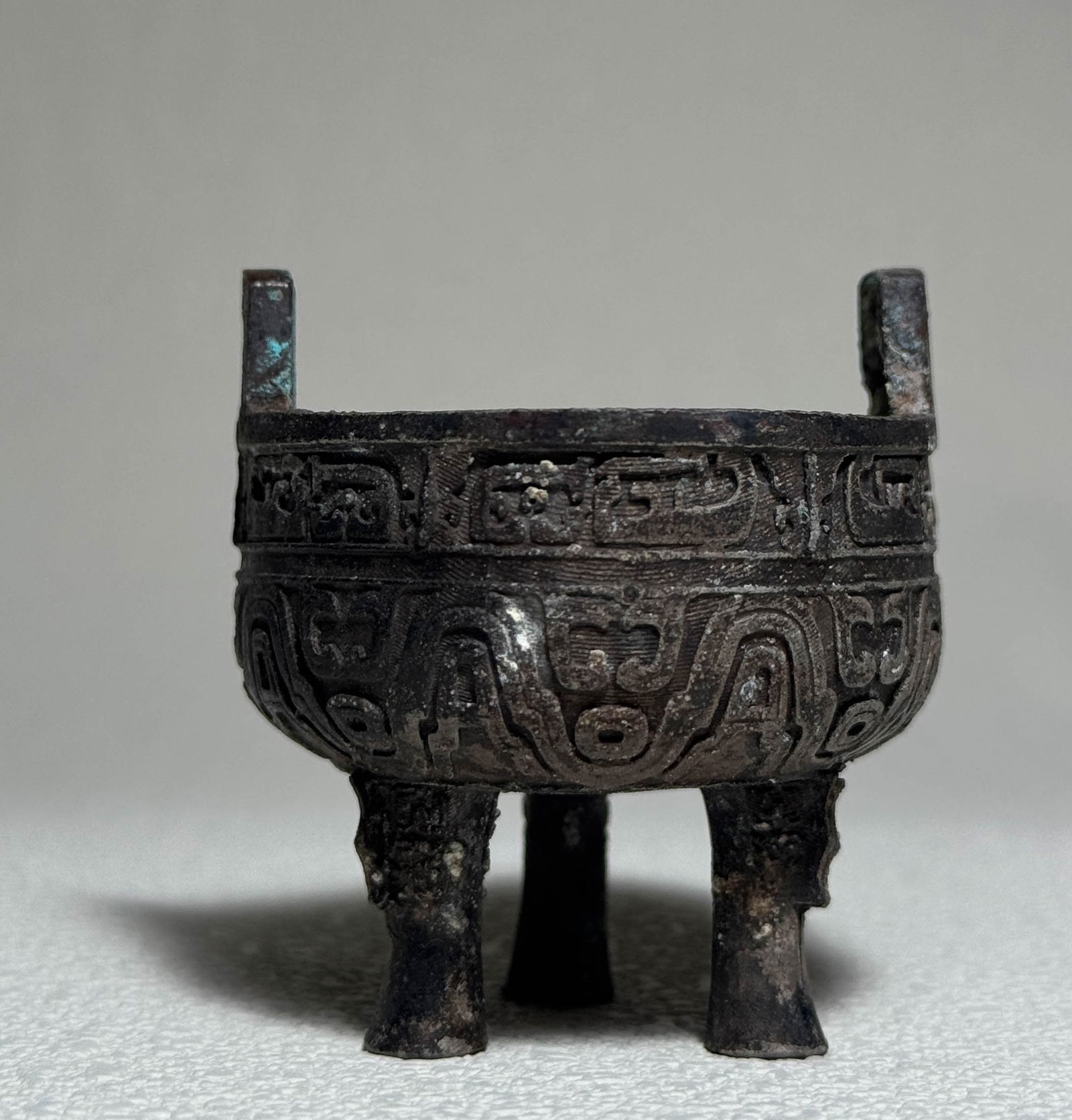 Han Dynasty Three legged Bronze Tripod: H:5.5cm W:4.6cm