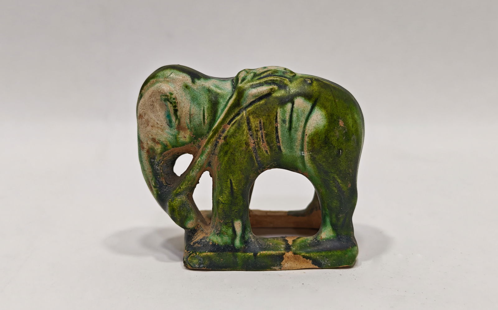 Tang Dynasty Three Colored Elephant: H:6.3cm L:7.3cm