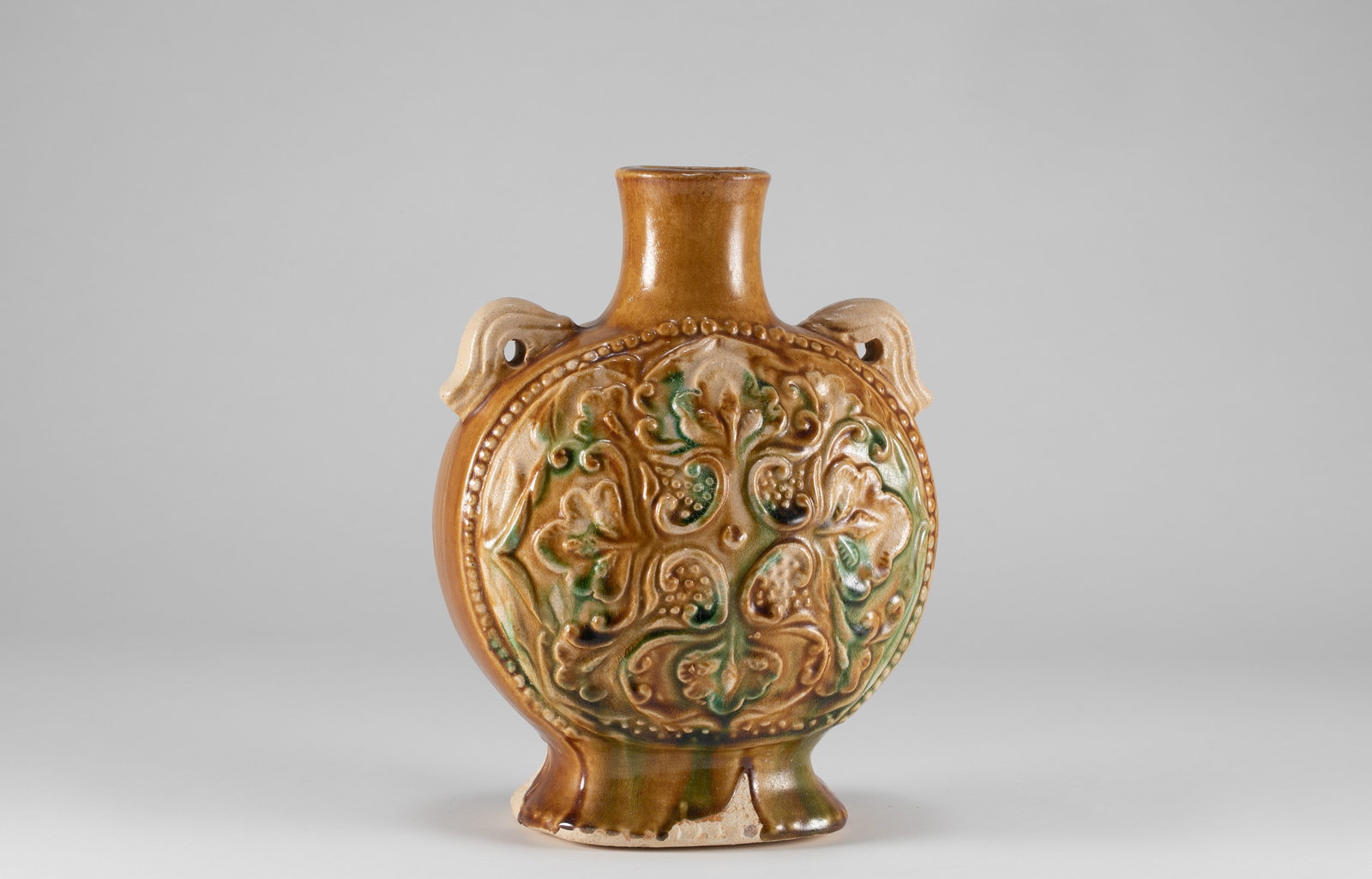 Tang Dynasty Tri colored Flat Pot: H:16.5cm W:13cm