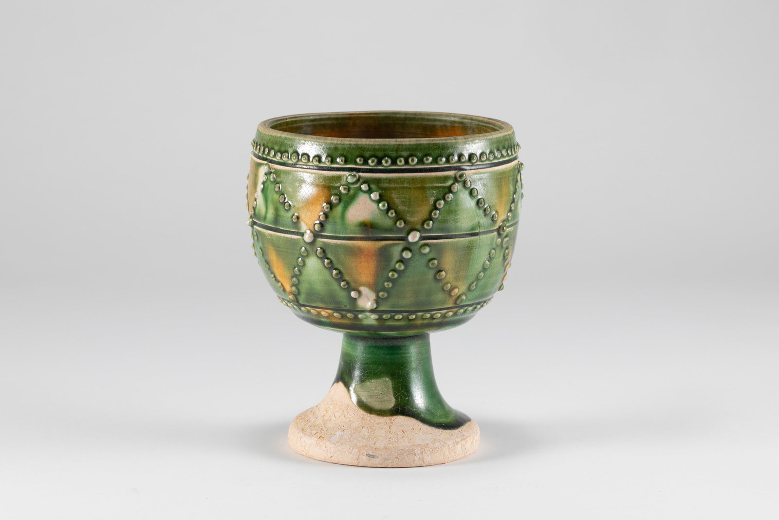 Tang Dynasty Tri colored High footed Cup: H:10.5cm D:8.5cm