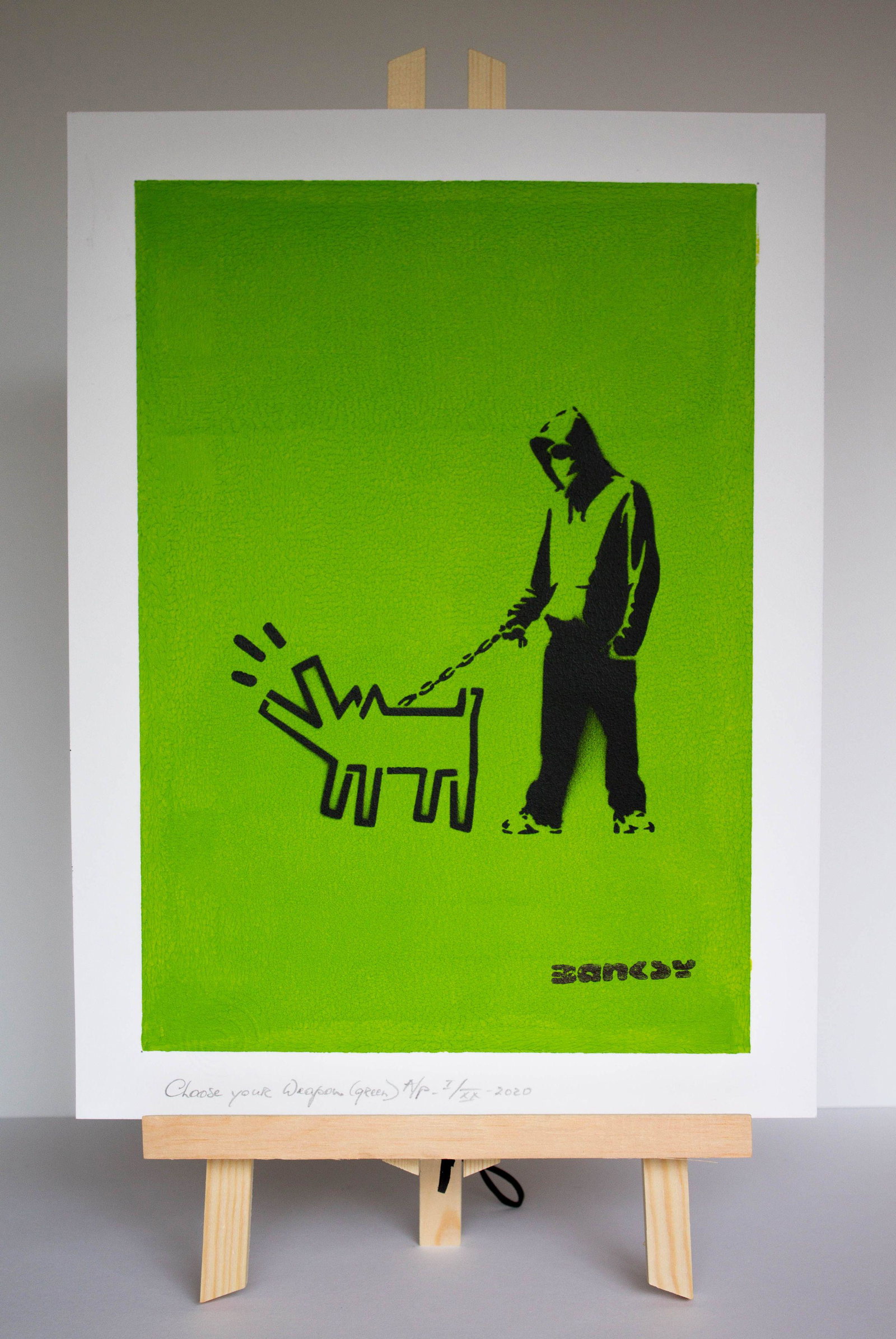 Banksy, after - Stencil/Spray.: Title: Choose your Weapon (Green). Banksy, after. Stencil/Spray. StreetArt. Edition: A/P (Artist Proof) Random/XX. Comes with Signed COA card of the Publisher. Signature imprimÃ©e (signed in plate).