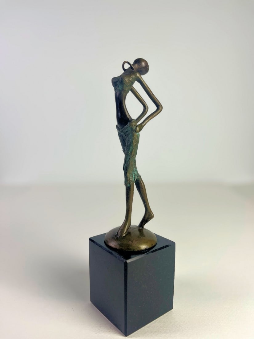 Bronze sculpture: Very beautiful bronze sculpture on Granite base.Signed at bottom with monogram G.A.