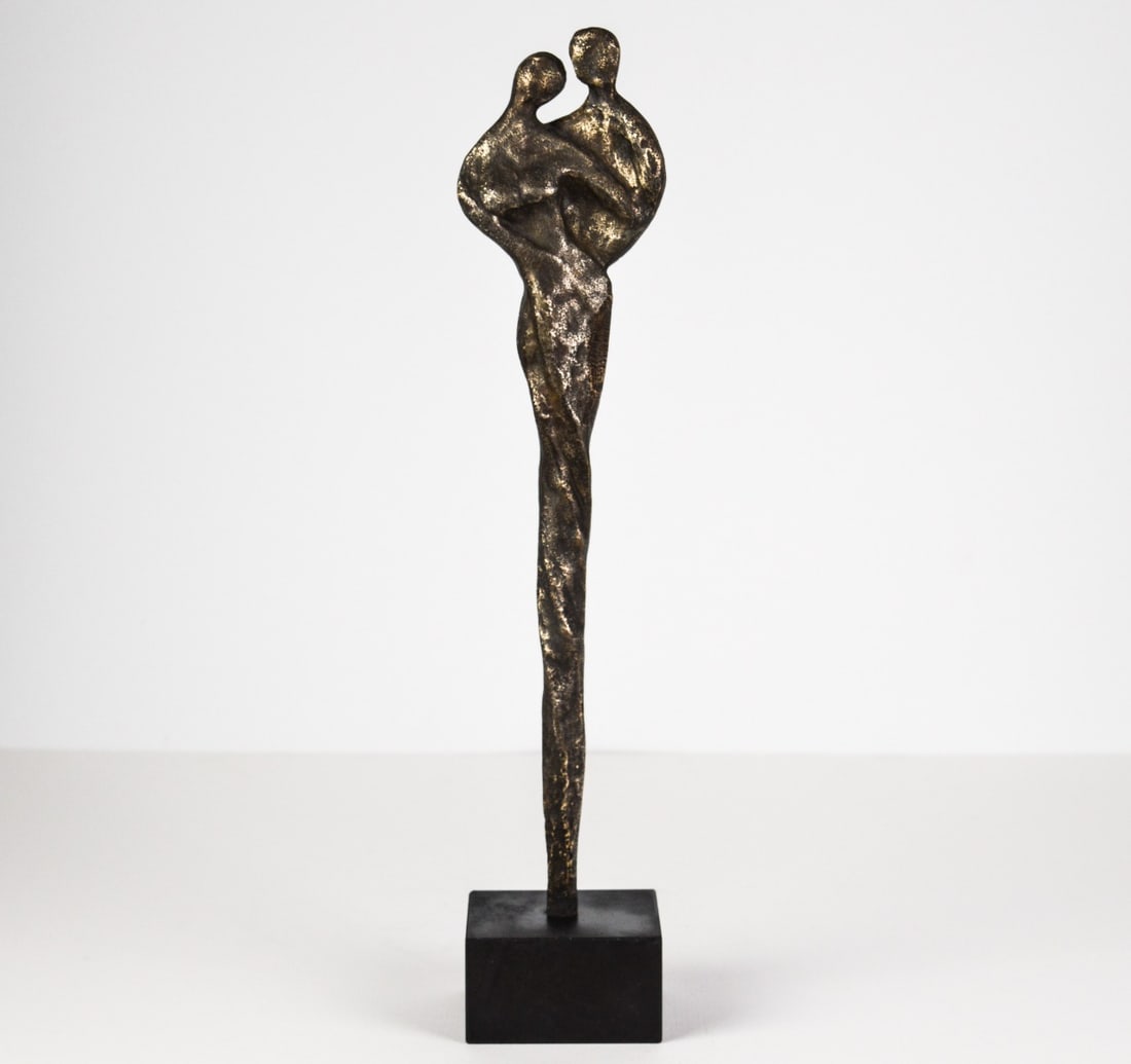 Elly du Clou-Bruggeman - sculpture on stone base: Elly du Clou-Bruggeman 1953.Is a contemporary Dutch sculptor who specialises in bronze sculptures of stylised human figures. Her work almost always revolves around connection, love, encounters, family