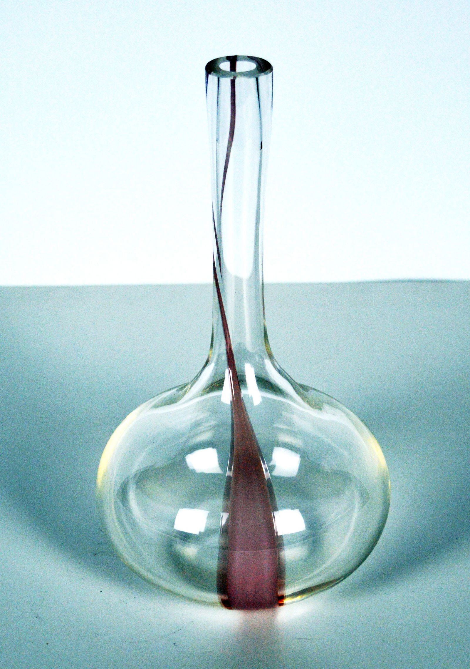 Murano Vase - Glass object.: Elegant Murano art glass vase with a clear rounded body and slender neck, accented by a soft rose-pink ribbon. A timeless piece of Venetian craftsmanship.