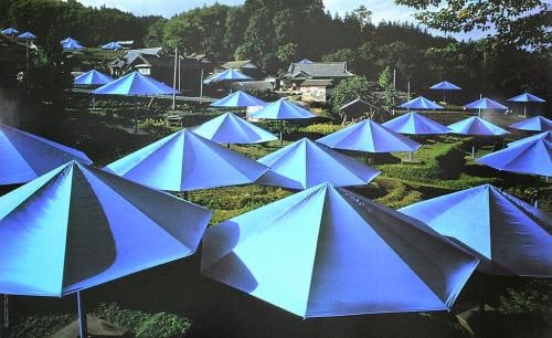 Christo - The Umbrellas, Japan - Photo lithography: Christo - Photo lithographyPhoto: Wolfgang VolzCopyright: ChristoChristo Vladimirov Javacheff (1935–2020) and Jeanne-Claude Denat de Guillebon (1935–2009), known as Christo and Jeanne-Claude,