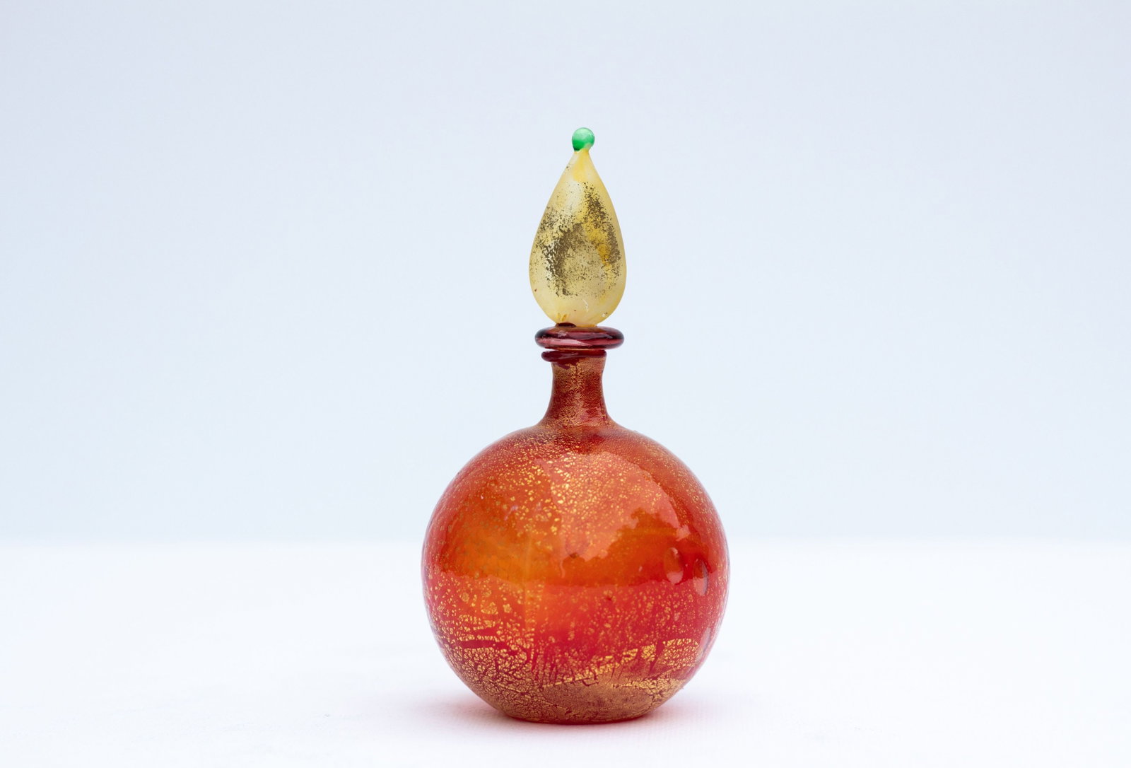 Round Murano Perfume Bottle: Artist: Murano Title: Round Murano Perfume Bottle Technique: Glass on Glass size: 8 x 14,5 cm. (3,15 x 5,7 inch) Framed: Not framed More Information Round Murano Perfume Bottle, Original item made by