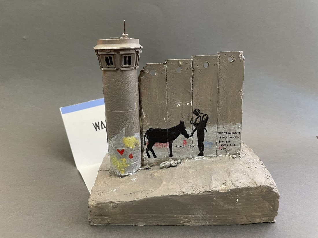 Banksy - Walled Off Hotel - Sculpture - receipt included: Artist: Banksy Title: Banksy Walled Off Hotel - Wall Sculpture Technique: Sculpture on Multimedia size: 14 x 13 cm. (5,5 x 5,1 inch) Framed: Not framed More Information BANKSY Sculpture "WALLED