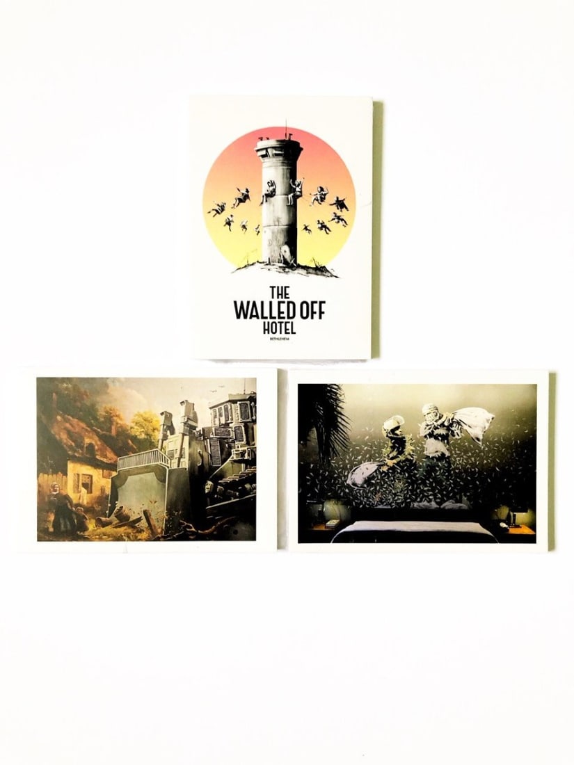 Banksy - Set Walled Off Hotel Postcards: Artist: Banksy Title: Set Walled Off Hotel Postcards Technique: Offset lithograph on Paper size: 14,8 x 10,5 cm. (5,85 x 4,15 inch) Framed: Not framed More Information Banksy Walled Off Hotel