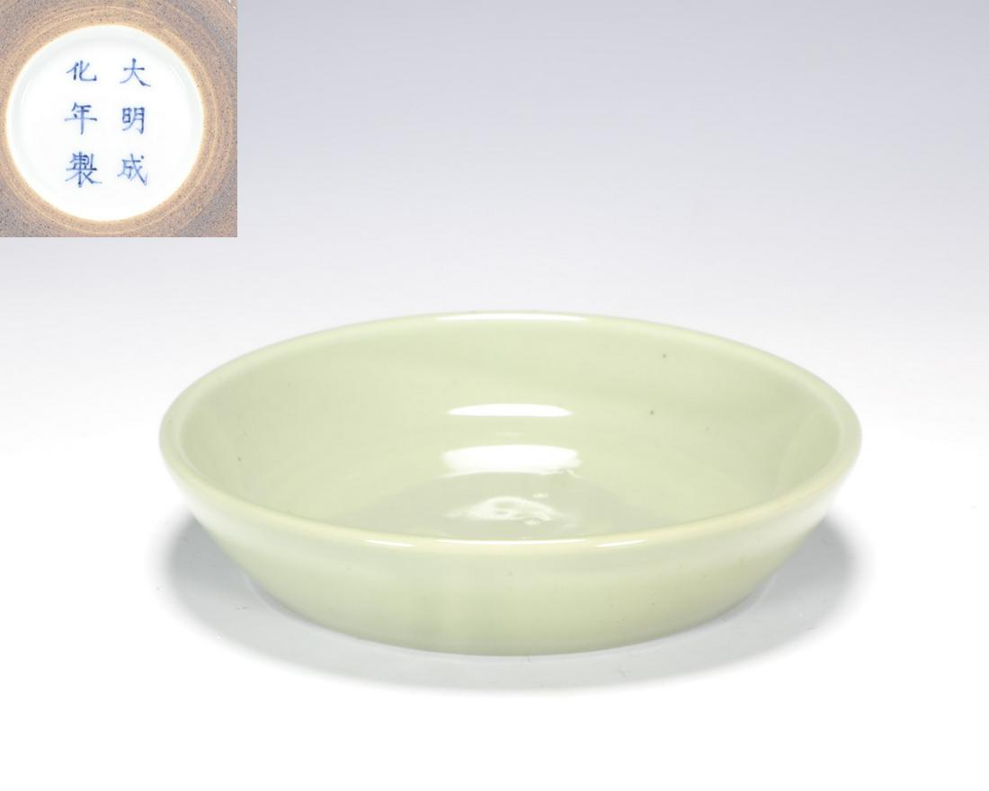 A CHINESE CELADON-GLAZED DISH (1 of 4)