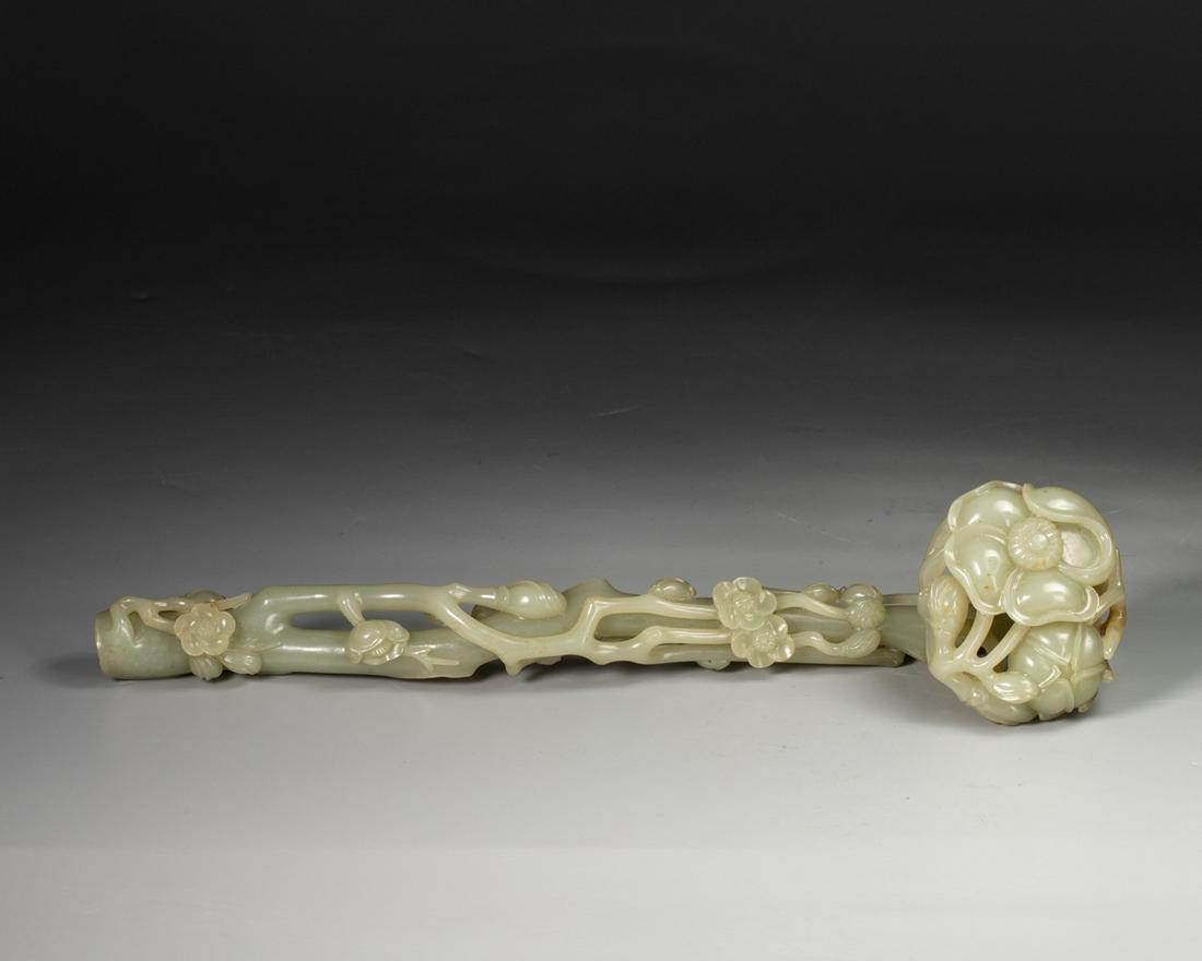 A CARVED WHITE JADE RUYI SCEPTER (1 of 7)