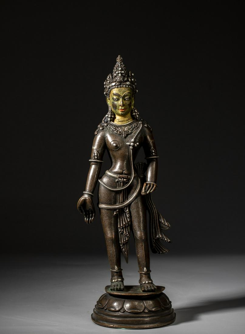 A SILVER-INLAID COPPER ALLOY FIGURE OF AVALOKITESVARA (1 of 9)