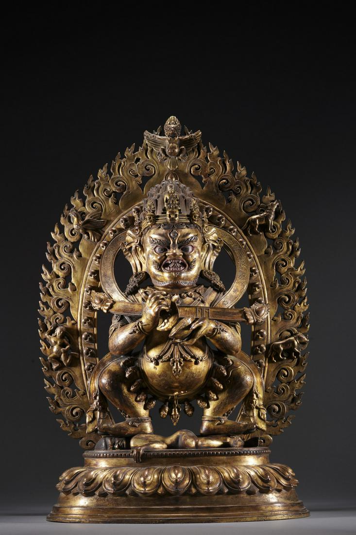 A GILT-BRONZE FIGURE OF MAHAKALA (1 of 9)
