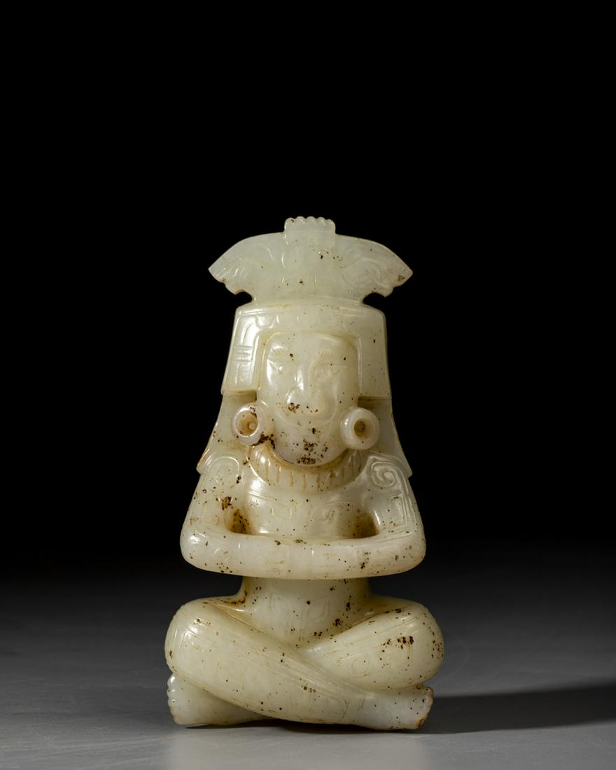 A CHINESE CARVED WHITE JADE HUMAN (1 of 7)