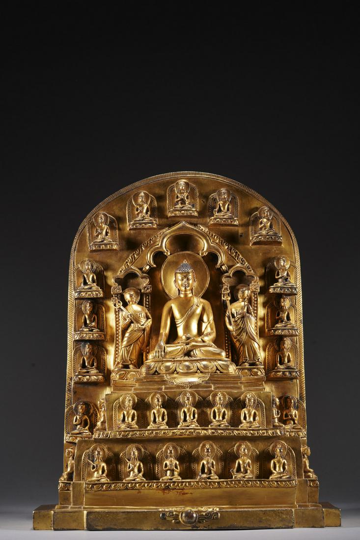 A GILT-BRONZE FIGURE OF SAKYAMUNI (1 of 11)
