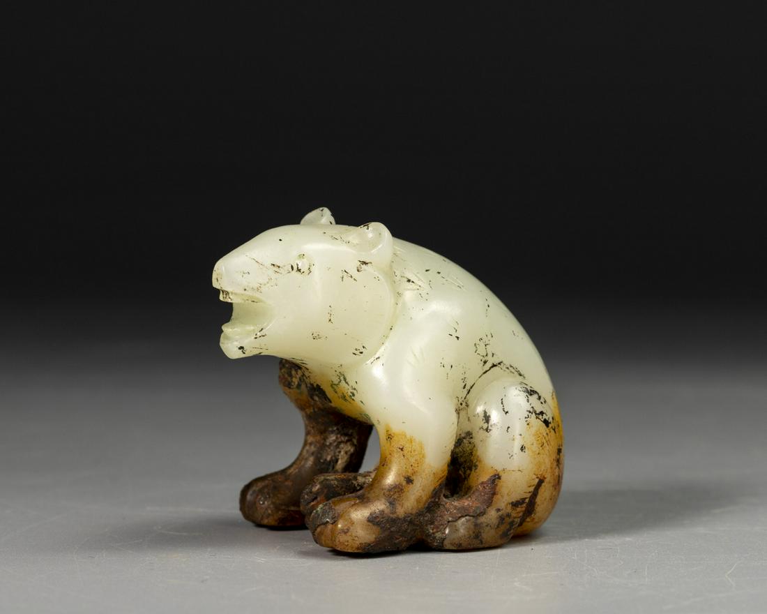 A CARVED JADE ORNAMENT (1 of 7)