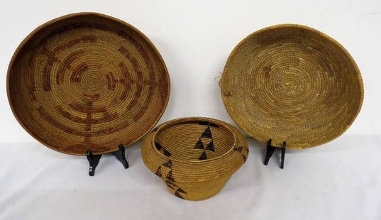 3 Native American Indian Woven Baskets: Lot of 3 Native American Indian woven baskets c.1900, one high rim is Apache 4.5" high x 9" diam at widest point, grain baskets are 12.5" diam for patterned basket, 11" for wheat colored basket