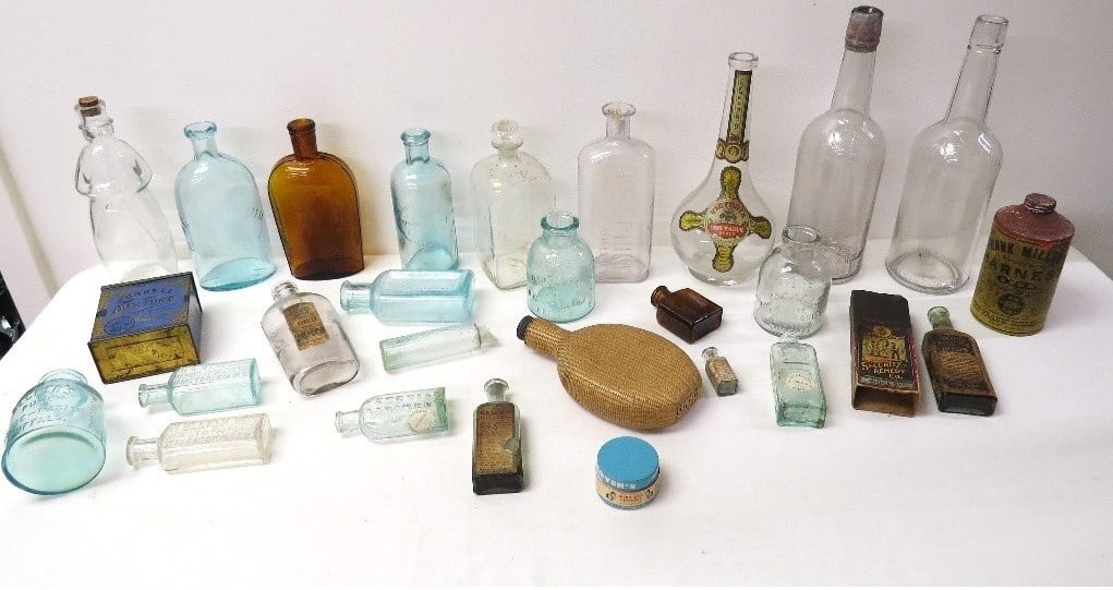 A collection of early tins & bottles c.1840-1900 (1 of 18)