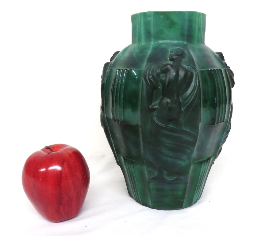 Schlevogt Moser â€œIngridâ€ Malachite Glass Vase, circa 1930s: A 1930's Era Czech Moser Malachite glass vase by Schlevogt.Called the â€œIngrid Vase.” The Pattern depicts four women in various poses separated by ribbed square panels.Combination of both g