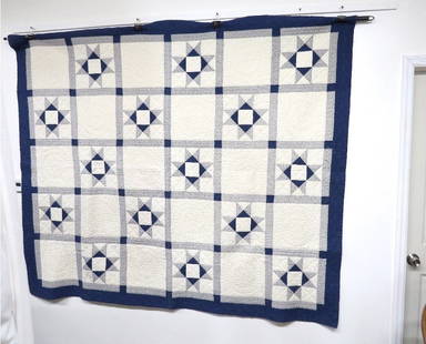 1985 Ramsey NJ Historical Society Star Quilt: Attic find, machine stitched star patterned blue/white quilt from the Ramsey NJ Historical Society, 1985. Minor damage on 1 edge, approximately 72" wide and 84" long, reverse side is an overall ivory