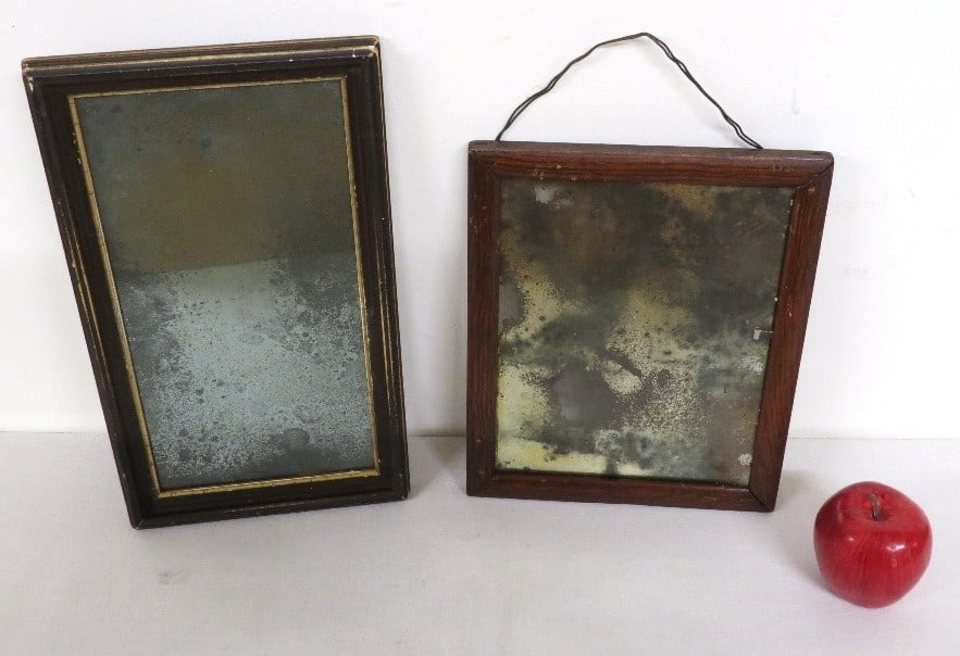 A Pair of mid 19th C. Primitive Mirrors: Two 19th C. Primitive mirrors with that desireable look of fogging and deslivering, giving them an ancient look. Great decorator pieces, measuring 9.5" x 11.5" and 8.5" x 14" in size.