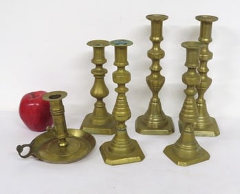 A Group of English Beehive Brass Candlestick Lighting