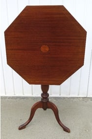 A Mid-Century Star Inlaid Mahogany Tea Table