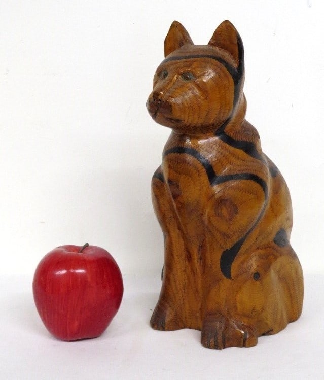 A Carved Folk Art Wooden Cat Signed R. Allard 86': A carved folk art style sitting cat signed R. Allard, 86. Multicolored wooden graining, stands 8.5" in height