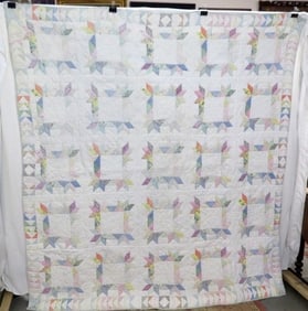 A colorful Quilted Square 20th C. Patterned Quilt