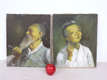 A pair of chinese o/c portrait paintings late 19th C.