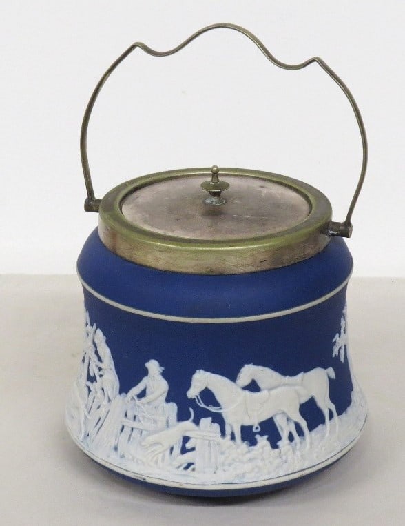 A Wedgwood Blue Jasperware Biscuit Jar: Wedgwood Blue Jasperware Biscuit Jar with silver plating (some plating wear). Overall scene of horses and hounds, possibly on a fox hunt.