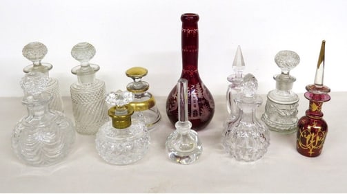 A large grouping of cologne, perfume & barber bottles