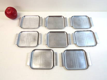 8 Art Deco Norman Bel Geddes Canapes Trays by Revere, Rome NY: 8 vintage Revere, Rome NY marked Canapes trays by designer Norman Bel Geddes, each is about 6.75" x 4.75" in size. Brushed stainless finish over brass, some light wear/finish marks from use but