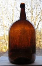 A mid-19th C. Stoddard Form Demijohn
