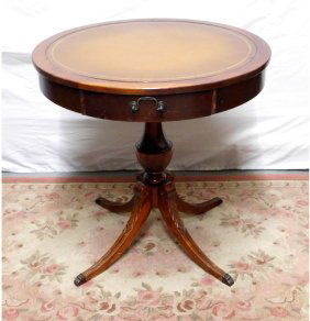 A Mersman Mahogany Leather Top Barrel Table