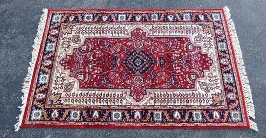 A Beautiful Hand Knotted Persian Mashad Area Rug