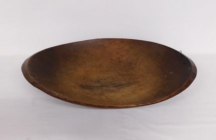 An Carved Oval Form Wooden Trencher