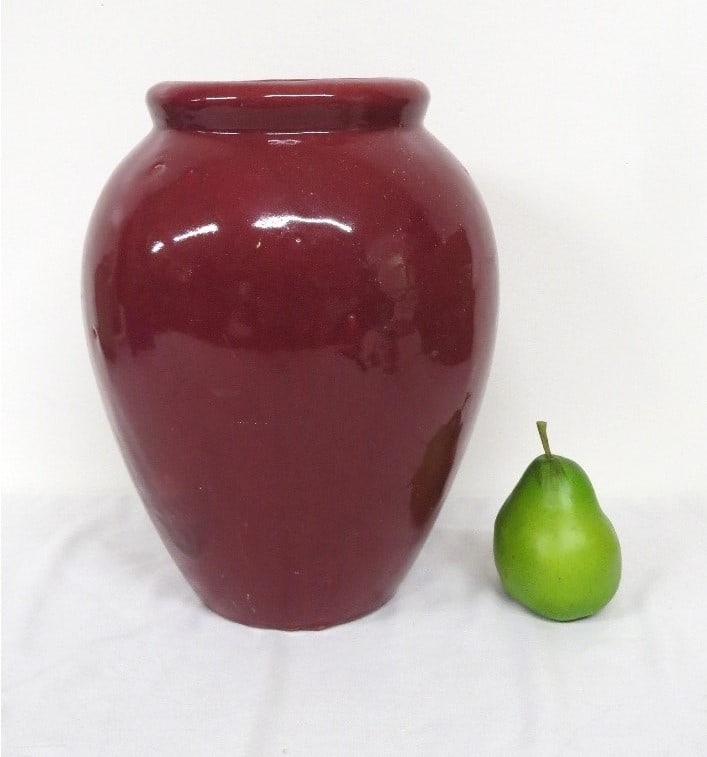 1920's-30's Nelson McCoy 12" Burgundy Red Jar / Vase: 1920's-30's Era Nelson McCoy Pottery Burgundy Red Vase or "oil jar" as we've seen them called. 12" in height, heavily glazed on the bottom but a faint NM mark for Nelson McCoy is there. No cracks, rin
