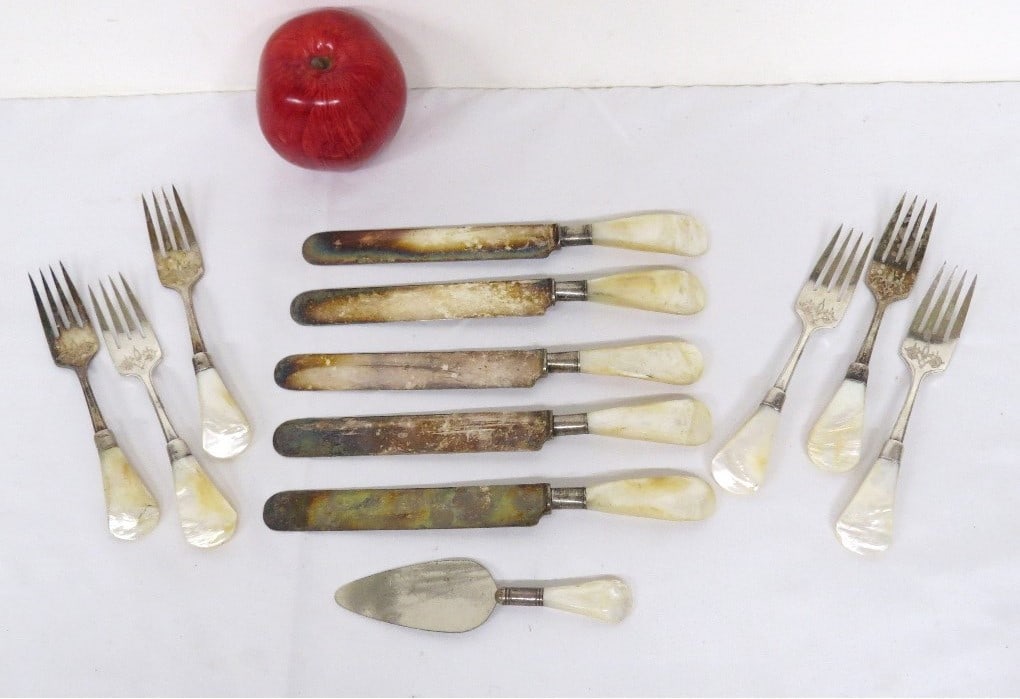12 Mother of Pearl & Sterling Mounted Forks & Knives.: Victorian era sterling mounted forks and knives with mother of pearl handles, including small cheese slicer/cake server, 5 knives and 6 forks.