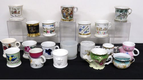 A Collection of 19 Antique Shaving Mugs