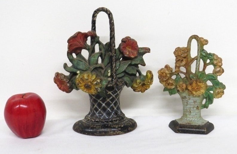 (2) Basket of Flower's Cast Iron Doorstops by Hubley: Pair of Basket of Flower's Cast Iron Doorstops polychromed paint, larger No. 120, smaller No. 329 marked Hubley