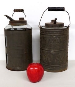 A Pair of Tin Jacketed 19th C. Kerosene Oil Jugs