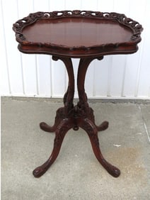 A Carved Mahogany Table In The Manner Of Flint & Horner.