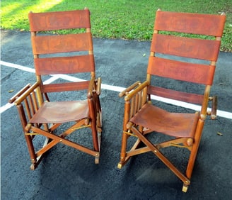 Pair of COSTA RICA Tooled Leather Wood Frame Rocking Chairs.