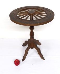 An Antique Wagon Wheel Top Table
