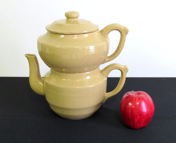 A 2 Part Yellow Ware Stacking Teapot